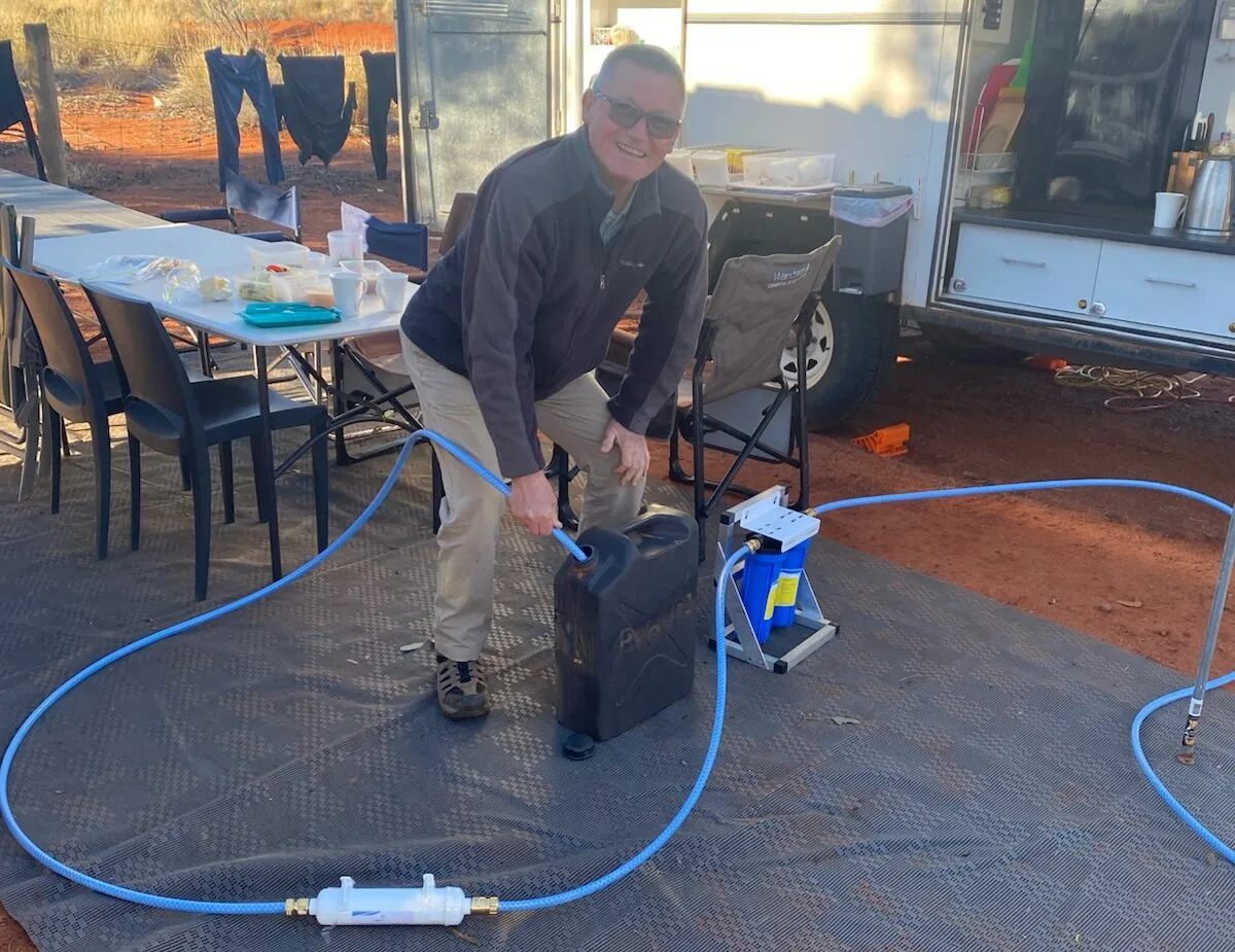 man installing 3 stage system